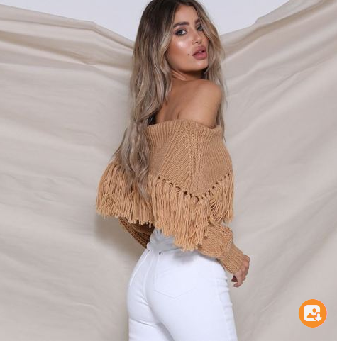 One-shoulder fringed sweater